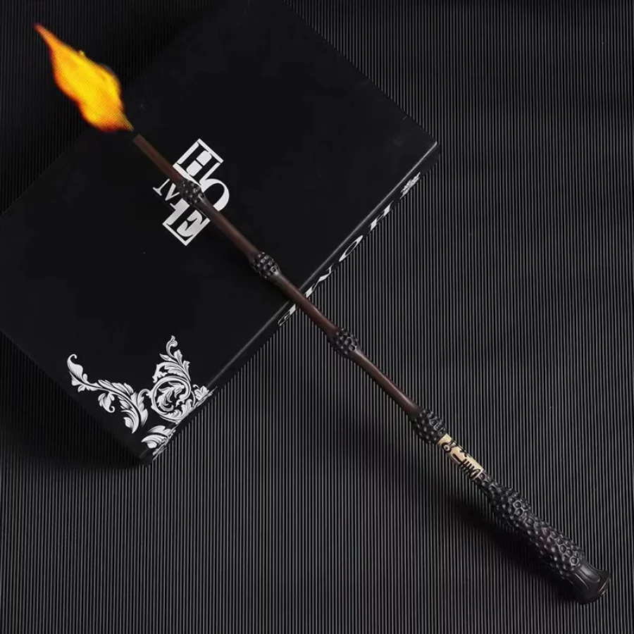 Fireball magic wand resting diagonally across a black gift box with silver detailing.